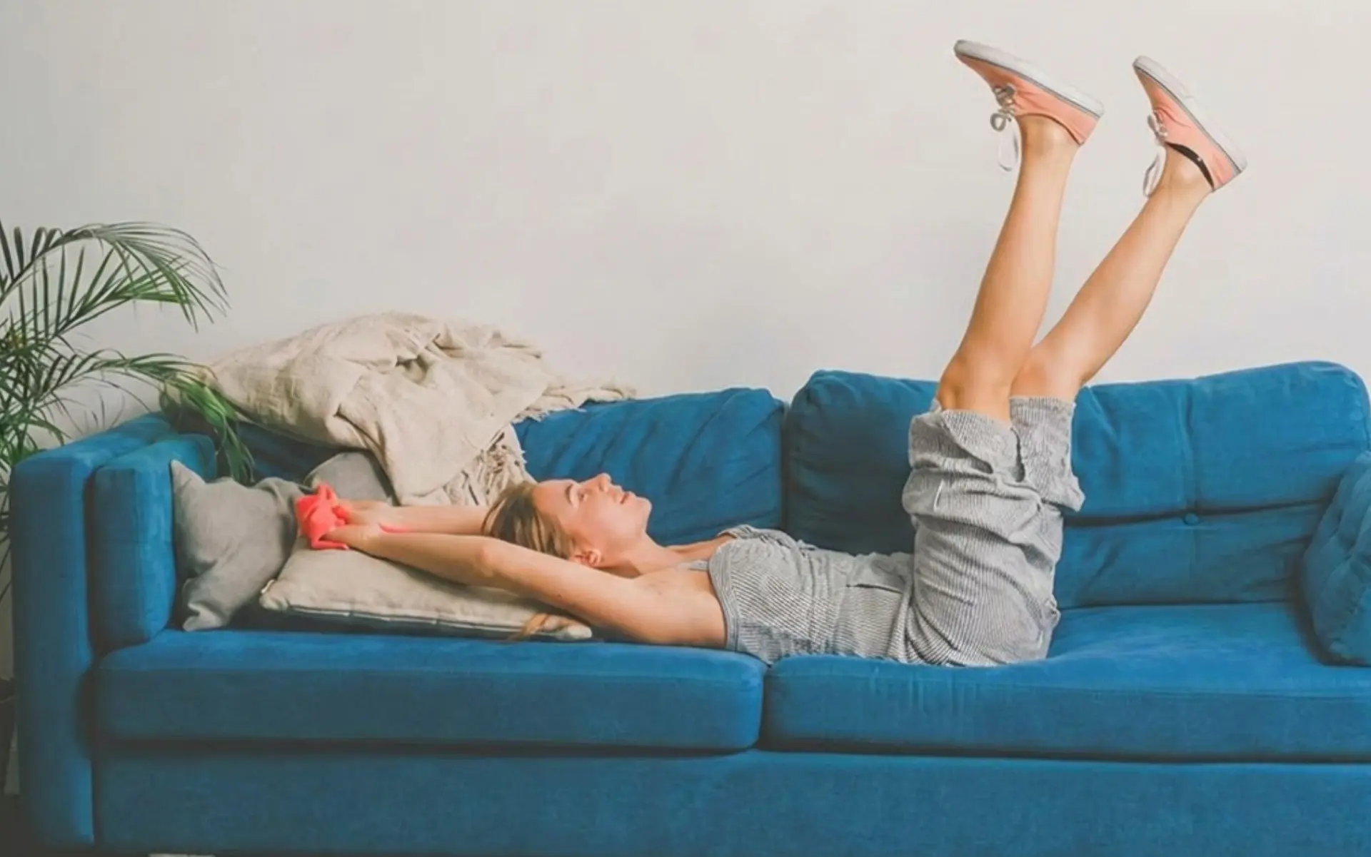 Woman relaxing at home after house cleaning services in Allen, TX