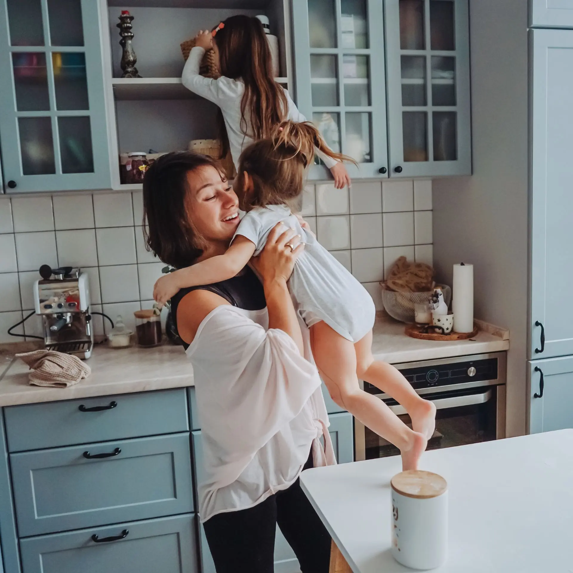 Mother and daughter enjoying a clean kitchen after house cleaning services in Allen, TX