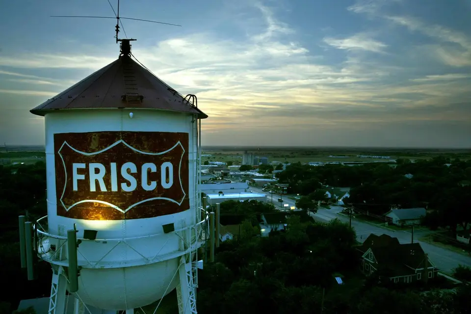 Frisco TX water tower at sunset, local house cleaning service in Frisco